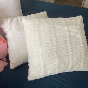 2 white pillows 22x22. Great condition. Fuzzy